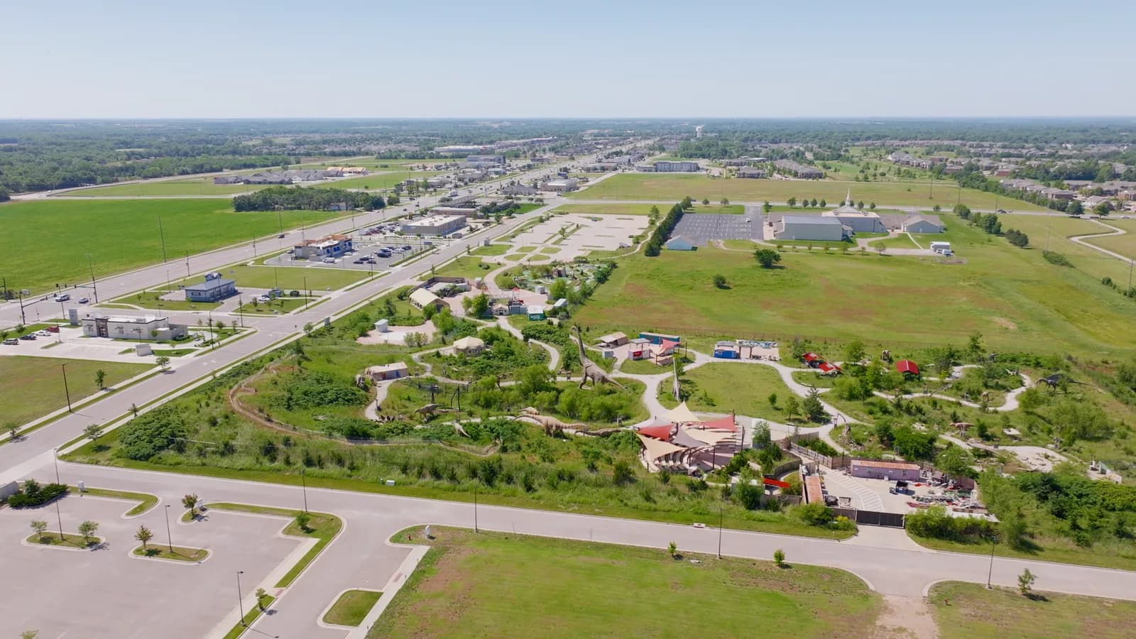 Aerial view of Field Station: Dinosaurs with trails and life-size dinosaur figures